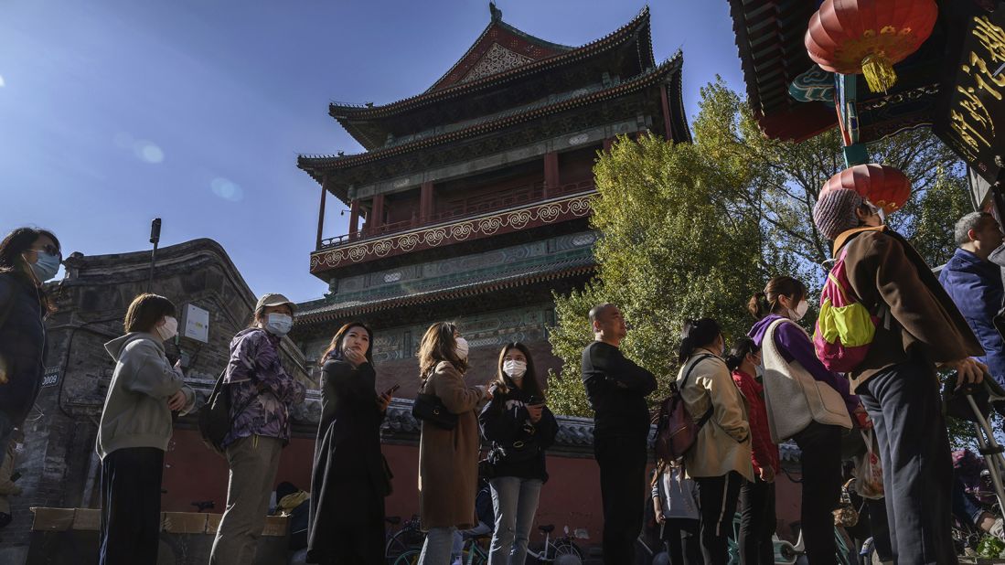 <strong>Long queue: </strong>The already-popular local eatery has been experiencing even longer lines in recent days. It sits next to Beijing's historical Gulou (drum tower), pictured here. 