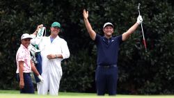 Jon Rahm of Spain celebrates with Rickie Fowler of the United States after skipping in for a hole in one on the 16th during a practice round prior to the Masters at Augusta National Golf Club on November 10, 2020 in Augusta, Georgia. (Photo by Rob Carr/Getty Images)