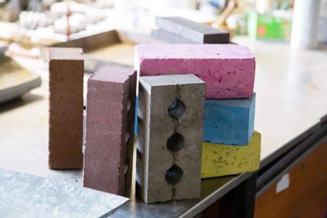 StoneCycling isn't the only company turning waste into bricks. Kenoteq's <a href="index.php?page=&url=https%3A%2F%2Fedition.cnn.com%2Fstyle%2Farticle%2Fgoing-green-kbriq-sustainable-brick-spc-intl%2Findex.html" target="_blank">K-Briq</a> -- which can be manufactured in any color, shape or size -- is made of 90% recycled construction waste.  Compared to a regular clay brick, it produces 10 times less carbon emissions. By installing its technology close to recycling plants, Kenoteq hopes to reduce carbon emissions from transporting the bricks, too. <br />
