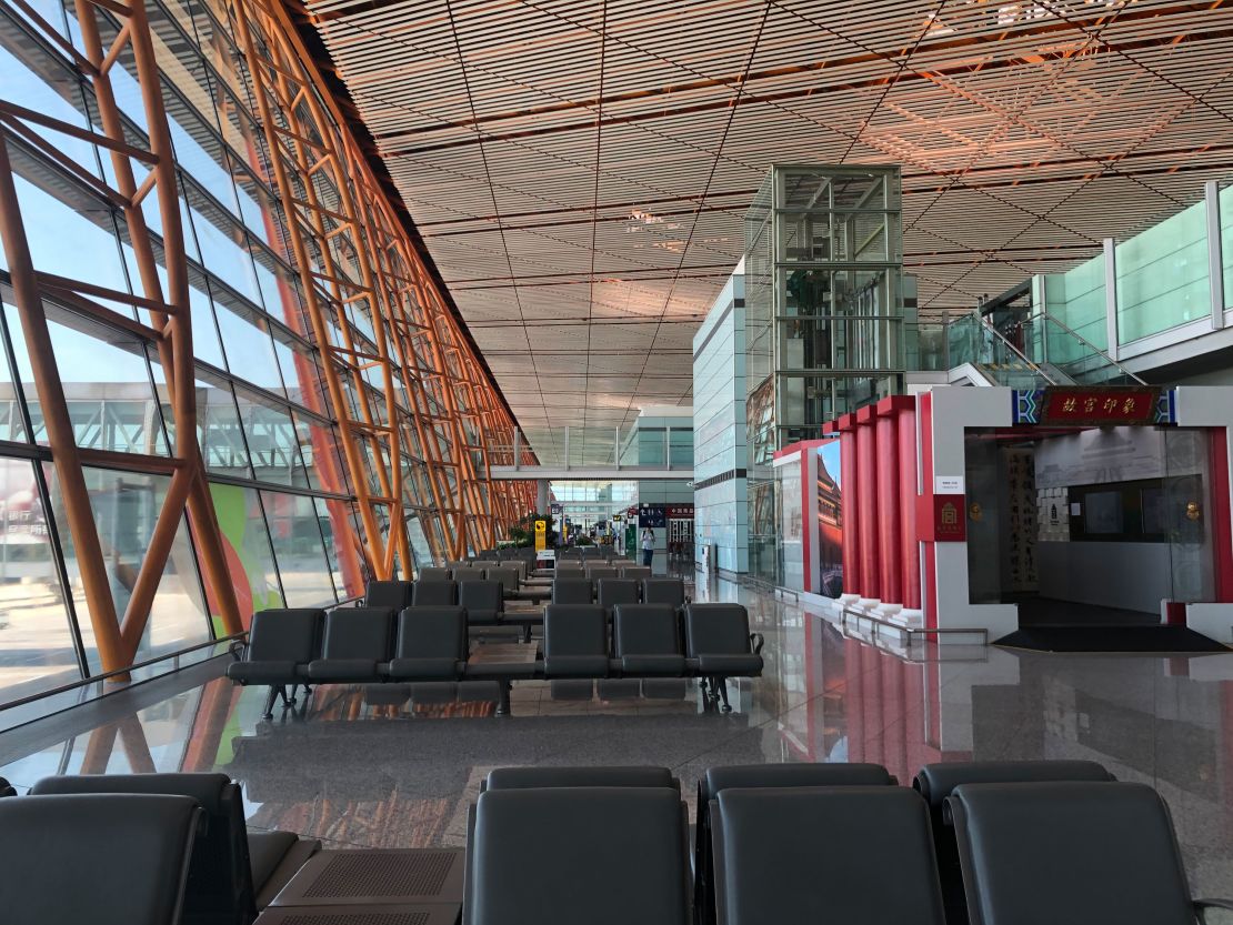 Wang was one of the few passengers at Hong Kong International Airport.