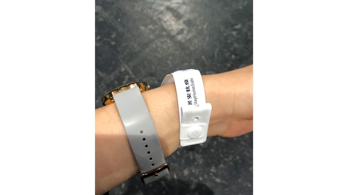Upon landing in Hong Kong, Wang was required to put on this bracelet.