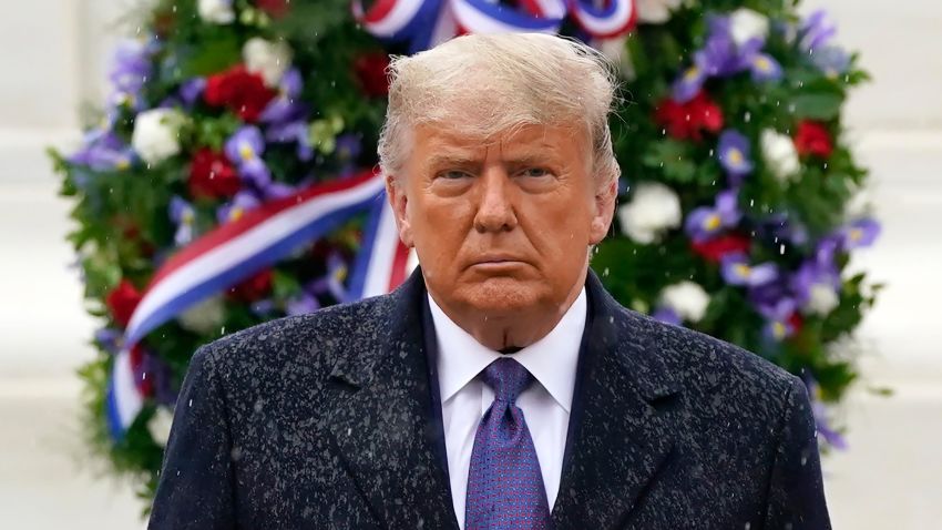 President Donald Trump participates in a Veterans Day wreath laying ceremony at the Tomb of the Unknown Soldier at Arlington National Cemetery in Arlington, Va., Wednesday, Nov. 11, 2020.
