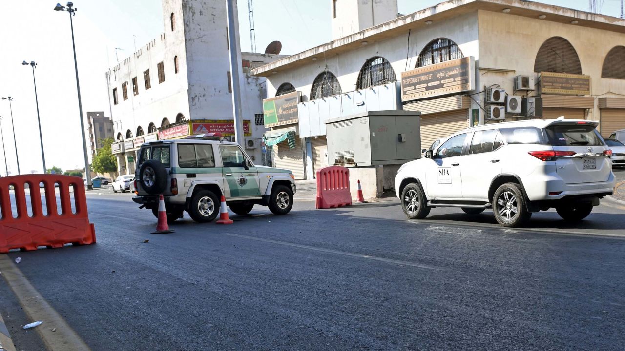 Saudi police close a street leading to a non-Muslim cemetery in Jeddah where a bomb struck a World War I commemoration.
