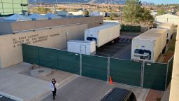Six mobile morgues sit outside the Medical Examiner's office in El Paso County. The morgues can hold up to 176 bodies, and more units are on the way.