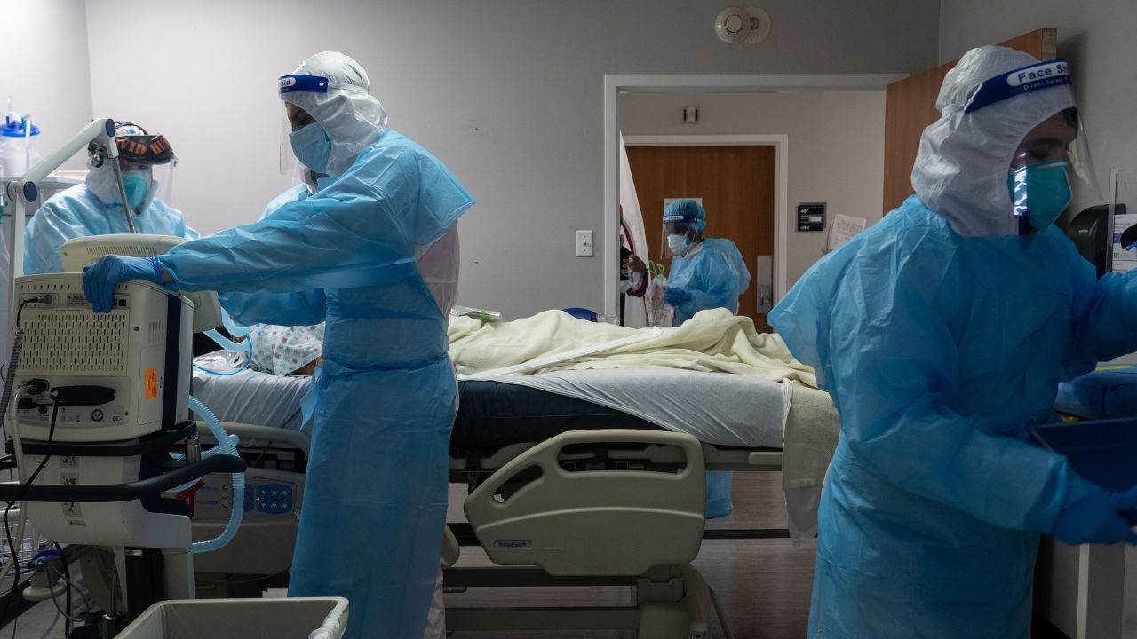 HOUSTON, TX - NOVEMBER 10: (EDITORIAL USE ONLY) Medical staff members treat a patient suffering from coronavirus in the COVID-19 intensive care unit (ICU) at the United Memorial Medical Center (UMMC) on November 10, 2020 in Houston, Texas. According to reports, COVID-19 infections are on the rise in Houston, as the state of Texas has reached over 1,030,000 cases, including over 19,000 deaths.  (Photo by Go Nakamura/Getty Images)