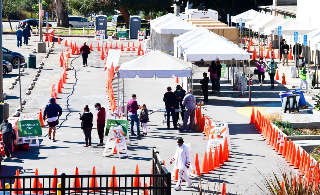 People wait in line to be tested at a Covid-19 test site in Los Angeles on November 10, 2020