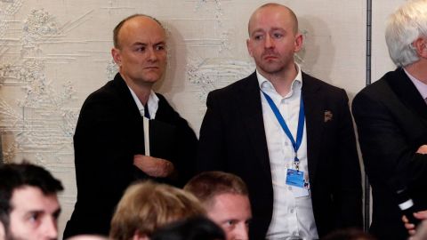 Dominic Cummings, left, and Lee Cain, right, attend a press conference by Boris Johnson in December 2019 in Watford, England.