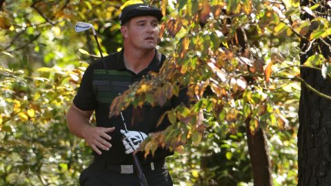 Bryson DeChambeau  played his second shot from the trees on the 11th hole at Augusta.