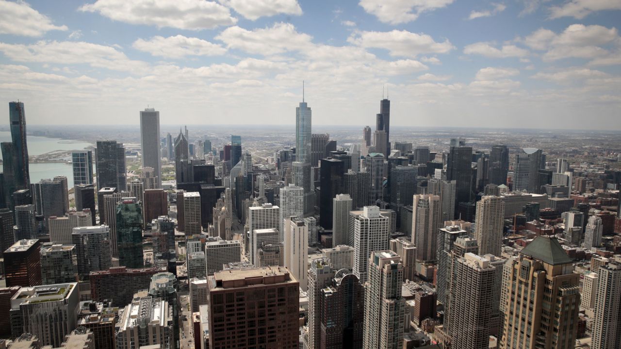 CHICAGO, ILLINOIS - MAY 12: A view from the 360 Chicago observation deck shows the city skyline, where most of the offices remain empty as work-from-home has become the new normal due to fears of the spread of COVID-19 on May 12, 2020 in Chicago, Illinois. 360 Chicago, one of the city's most popular tourist attractions located on the 94th floor of 875 North Michigan Avenue (formerly the John Hancock Center), also remains empty due to the pandemic. (Photo by Scott Olson/Getty Images)