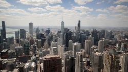 CHICAGO, ILLINOIS - MAY 12: A view from the 360 Chicago observation deck shows the city skyline, where most of the offices remain empty as work-from-home has become the new normal due to fears of the spread of COVID-19 on May 12, 2020 in Chicago, Illinois. 360 Chicago, one of the city's most popular tourist attractions located on the 94th floor of 875 North Michigan Avenue (formerly the John Hancock Center), also remains empty due to the pandemic. (Photo by Scott Olson/Getty Images)