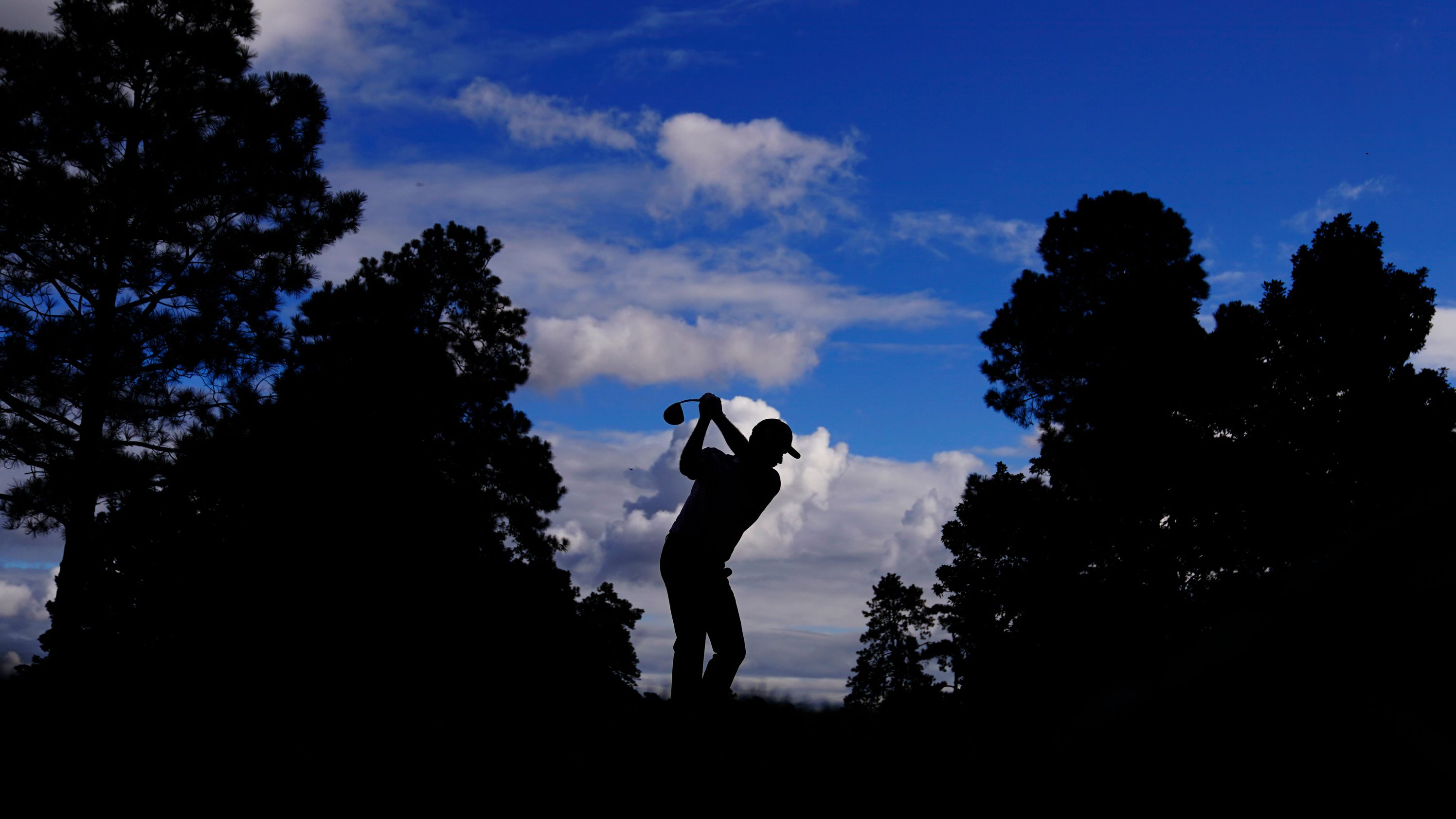 Simpson tees off on the ninth hole. The American finished the day five-under.
