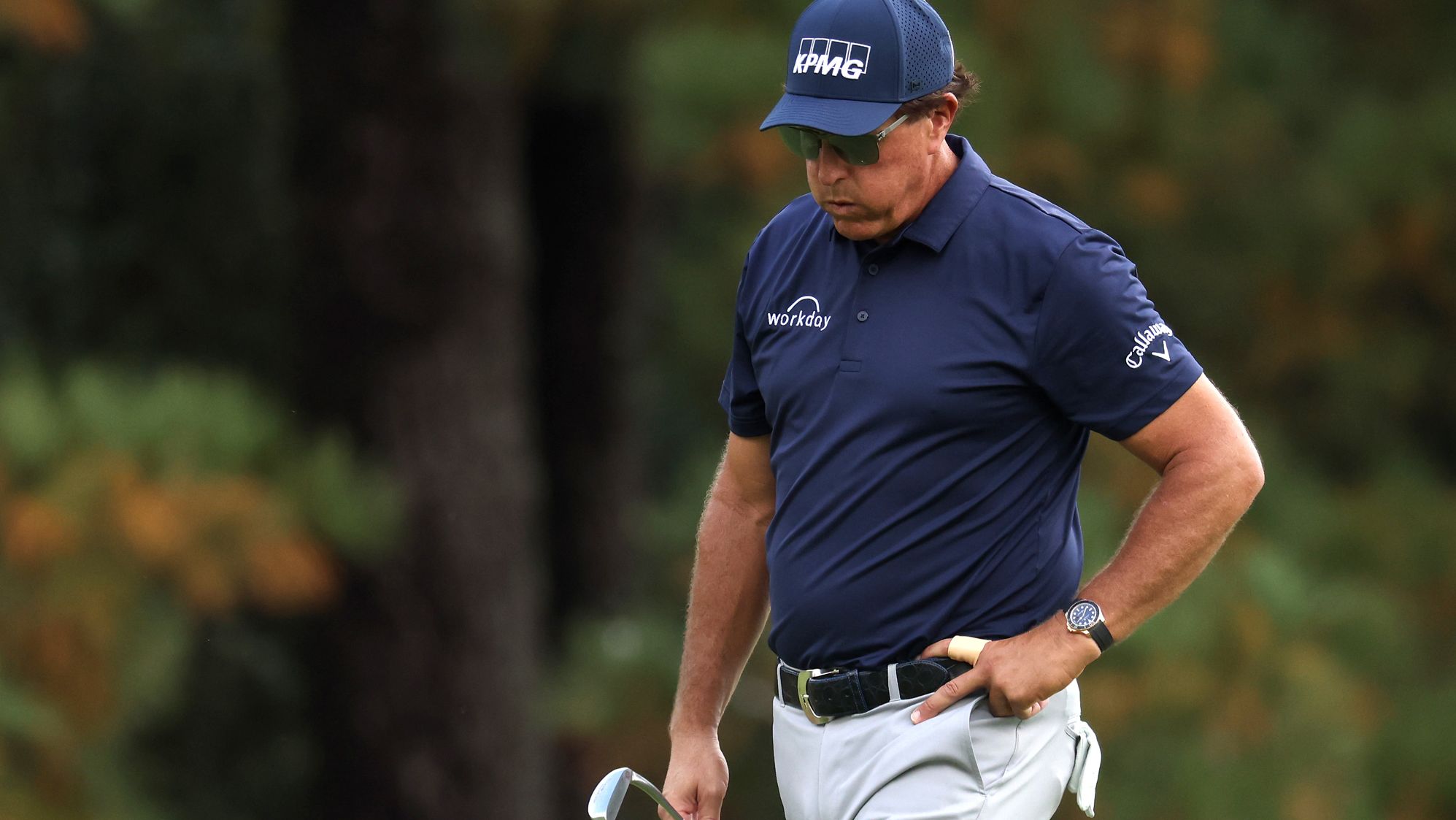 Phil Mickelson looks on. The three-time Masters champion finished four-under after his first round. 