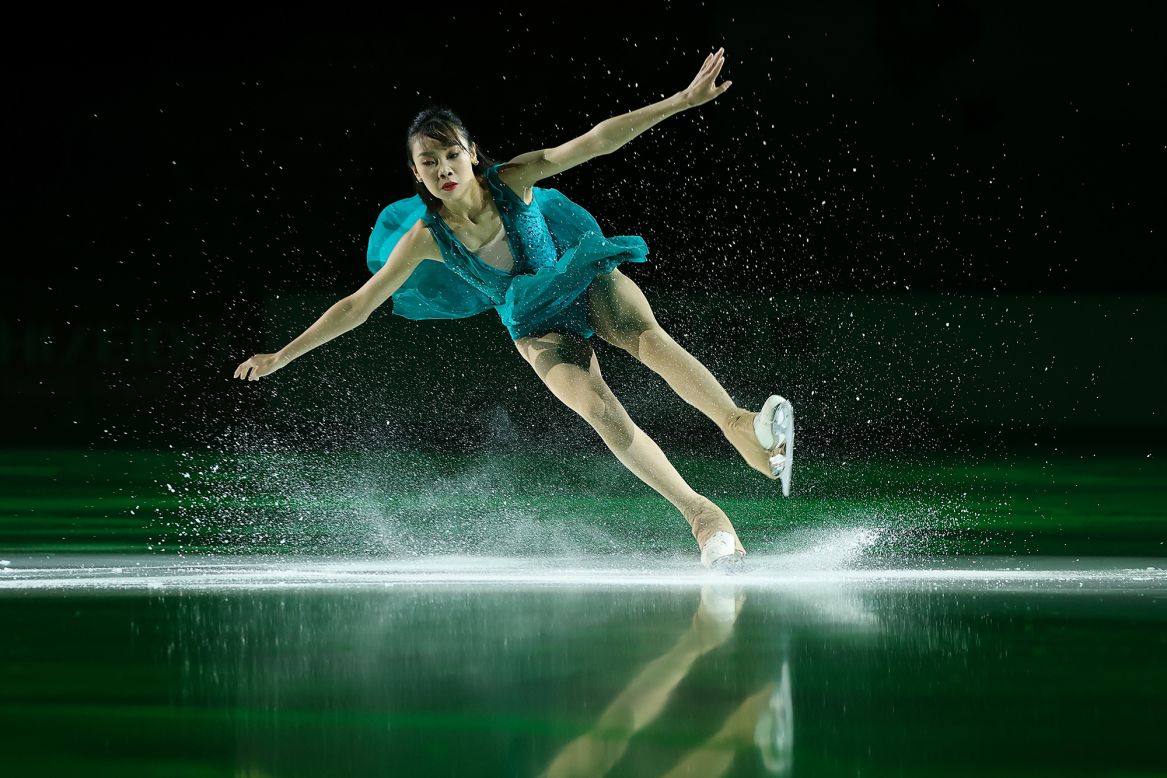 Figure skater Jin Hengxin performs during a gala exhibition in Chongqing, China, on Sunday, November 8.