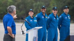 NASA astronauts Shannon Walker, left, Victor Glover, second from left, Mike Hopkins, second from right, and Japan Aerospace Exploration Agency (JAXA) astronaut Soichi Noguchi, right, being introduced by Kennedy Space Center Director Bob Cabana.