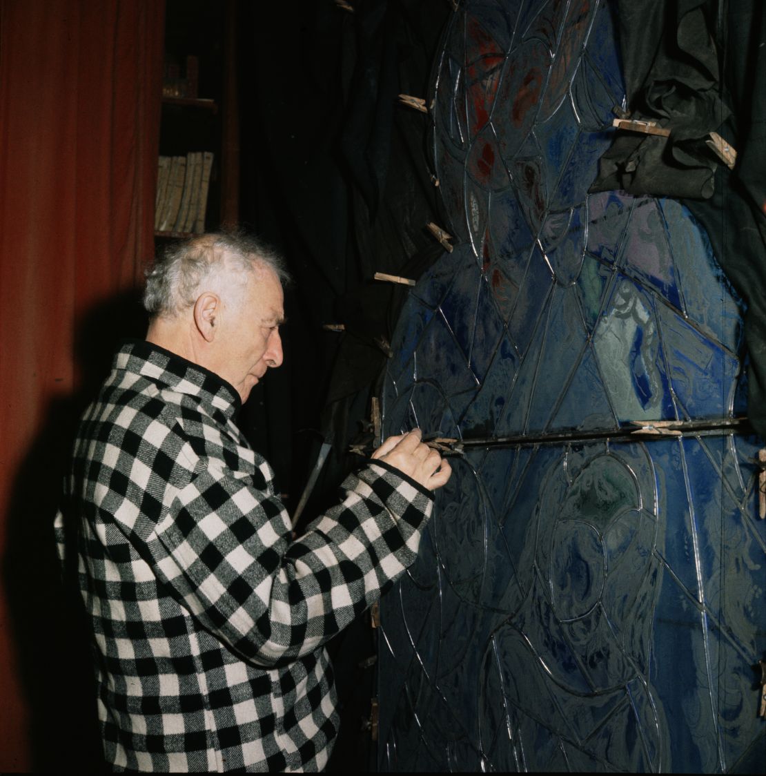 Marc Chagall works on a stained glass window for placement in Metz Cathedral.