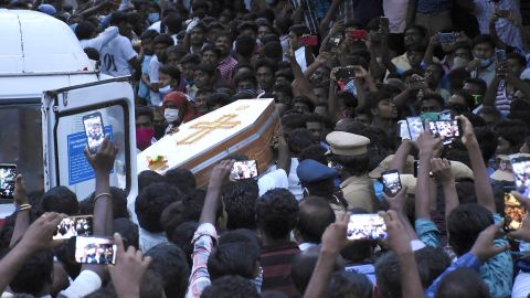 Residents gather as they carry the coffin of Jayaraj and son Bennicks, who were allegedly tortured at the hands of police in Sathankulam.