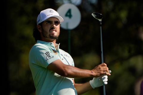 Abraham Ancer, of Mexico, watches his tee shot on the fourth hole on his way to the joint clubhouse lead on nine-under.