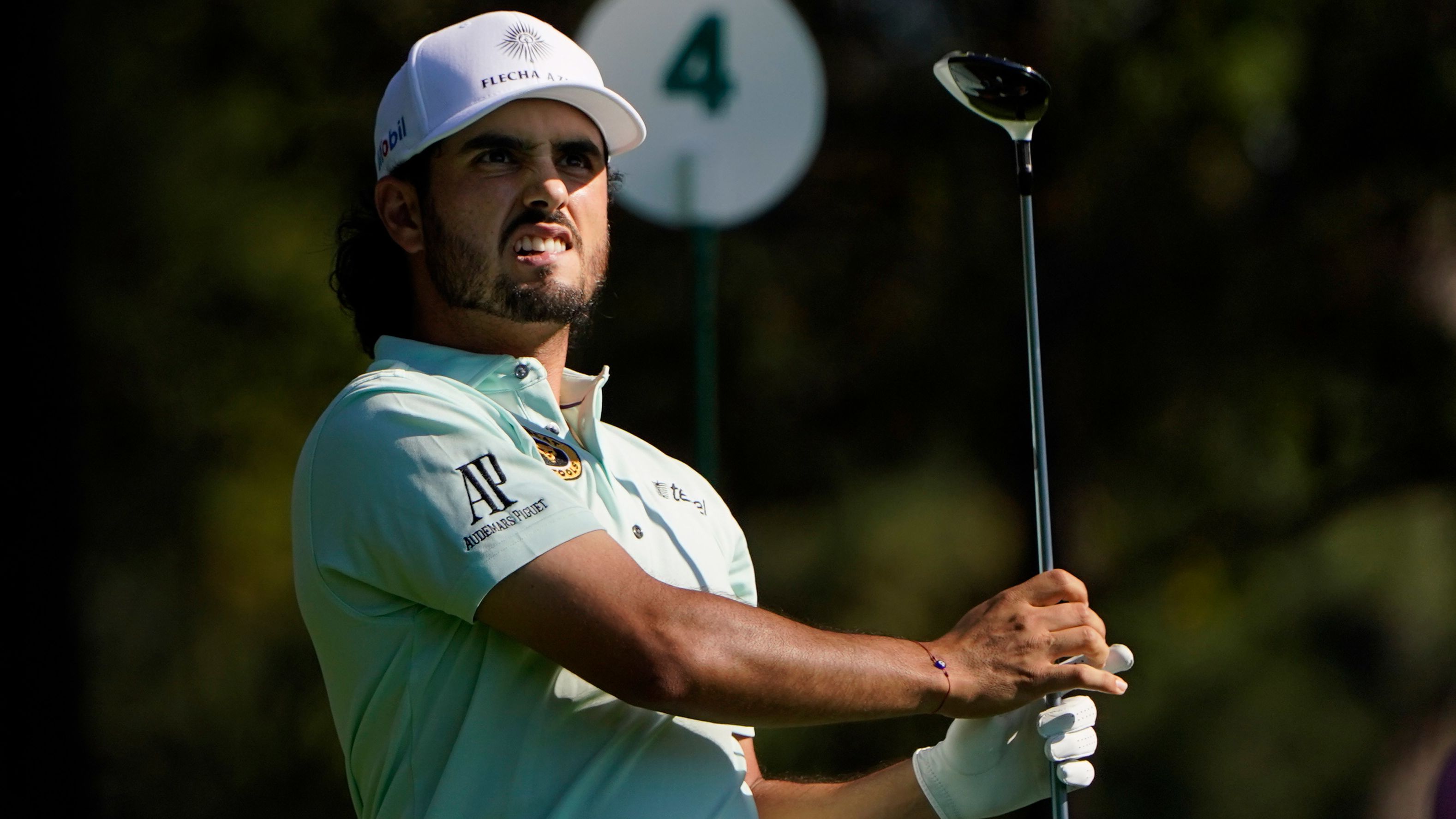 Abraham Ancer, of Mexico, watches his tee shot on the fourth hole on his way to the joint clubhouse lead on nine-under.