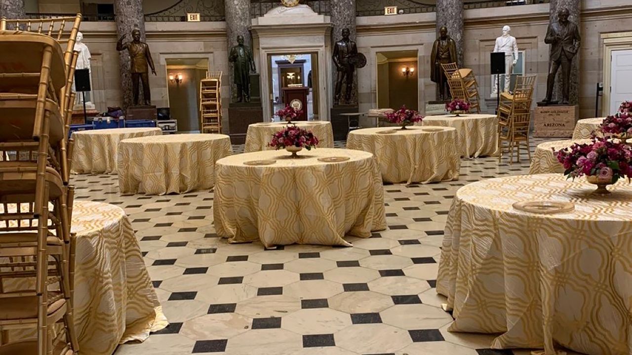 Tables spaced apart were set up in Statuary Hall Friday night for Democrats' new member dinner.