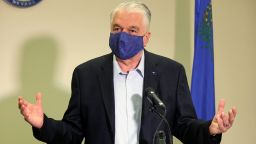 FILE - In this Friday, Oct. 2, 2020 file photo Nevada Gov. Steve Sisolak updates the state's COVID-19 response during a news conference at the Sawyer Building in Las Vegas. Nevada Gov. Steve Sisolak said that he had tested positive for COVID-19 on Friday, Nov. 13, 2020 as the virus surges to record levels in Nevada and throughout the United States.(K.M. Cannon/Las Vegas Review-Journal via AP, Pool, File)