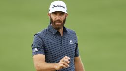 Dustin Johnson saves par on the ninth green on his way to winning the Masters for the first time.
