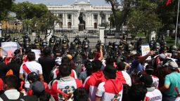 Protesters against the removal of President Martin Vizcarra gather in front of the Congress building in Lima, Peru, Sunday, Nov. 15, 2020. 