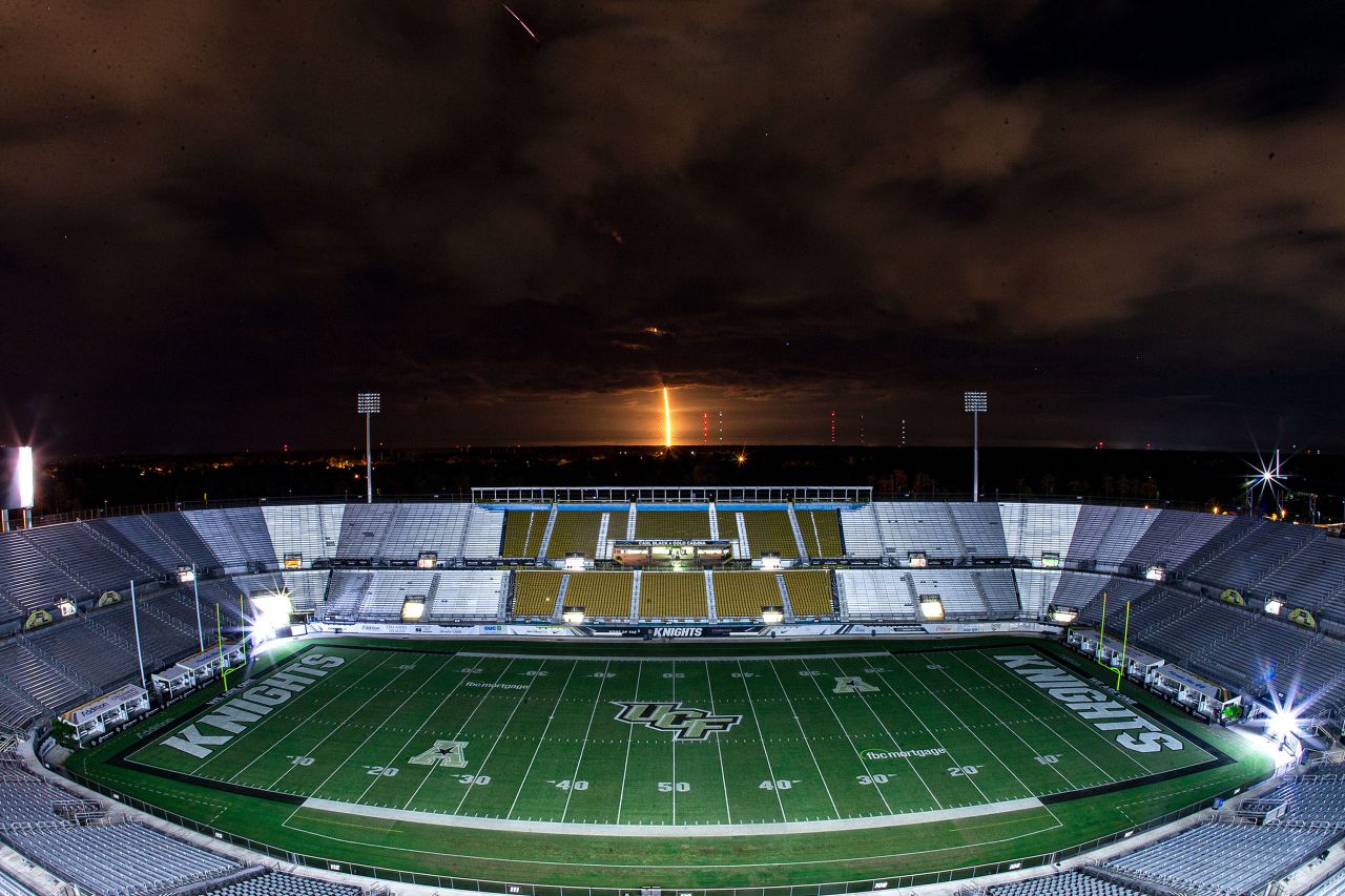 SpaceX's Falcon 9 rocket is seen over University of Central Florida's Bounce House-FBC Mortgage Field on November 15 in Orlando, Florida.