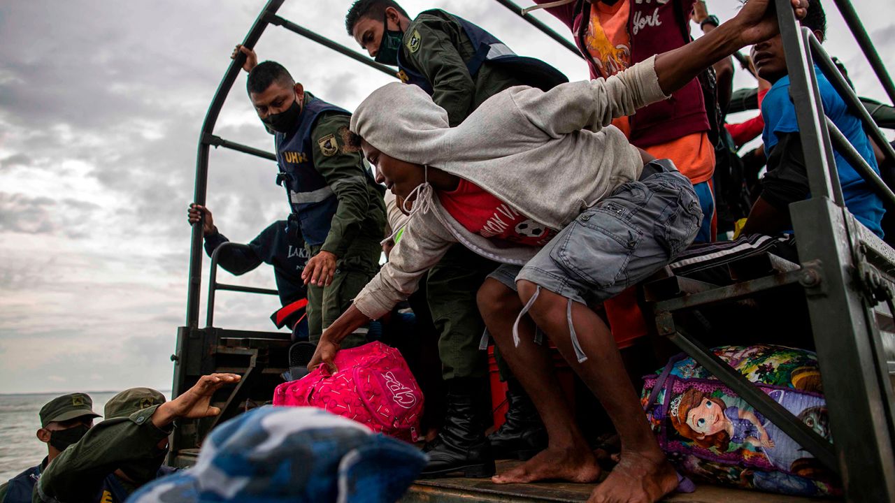 Nicaraguan Navy sailors help evacuate people from the Karata and Wawa Bar communities ahead of the arrival of Hurricane Iota in Bilwi, Puerto Cabezas, Nicaragua Sunday.
