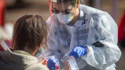 Marissa Gallegos with Medical Teams Northwest takes a swab from a person who was accessing COVID-19 testing at the Lane County Fairgrounds in Eugene, Oregon on October, 8, 2020. The site will be open on Friday from 2 - 6 p.m.

Print 4 Eug 100920 Lane County Drive Through Testing4