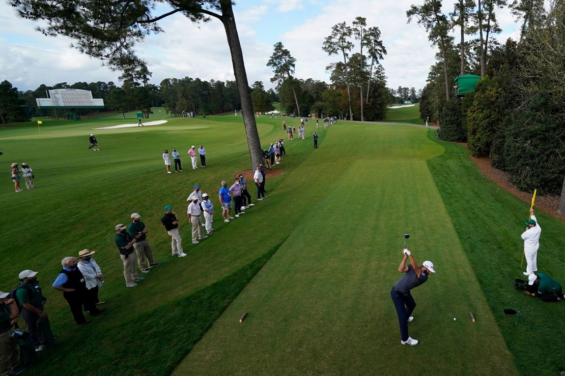 Johnson tees off on the 18th hole.