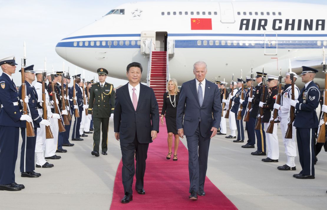 Chinese President Xi Jinping and his wife Peng Liyuan are welcomed by then-US Vice President Joe Biden and his wife at Andrews Air Force Base in Washington D.C. in 2015.