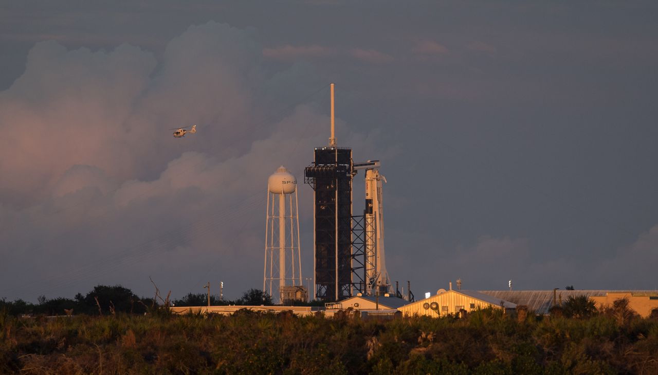 A NASA helicopter flies past the launch pad at Kennedy Space Center on November 15.