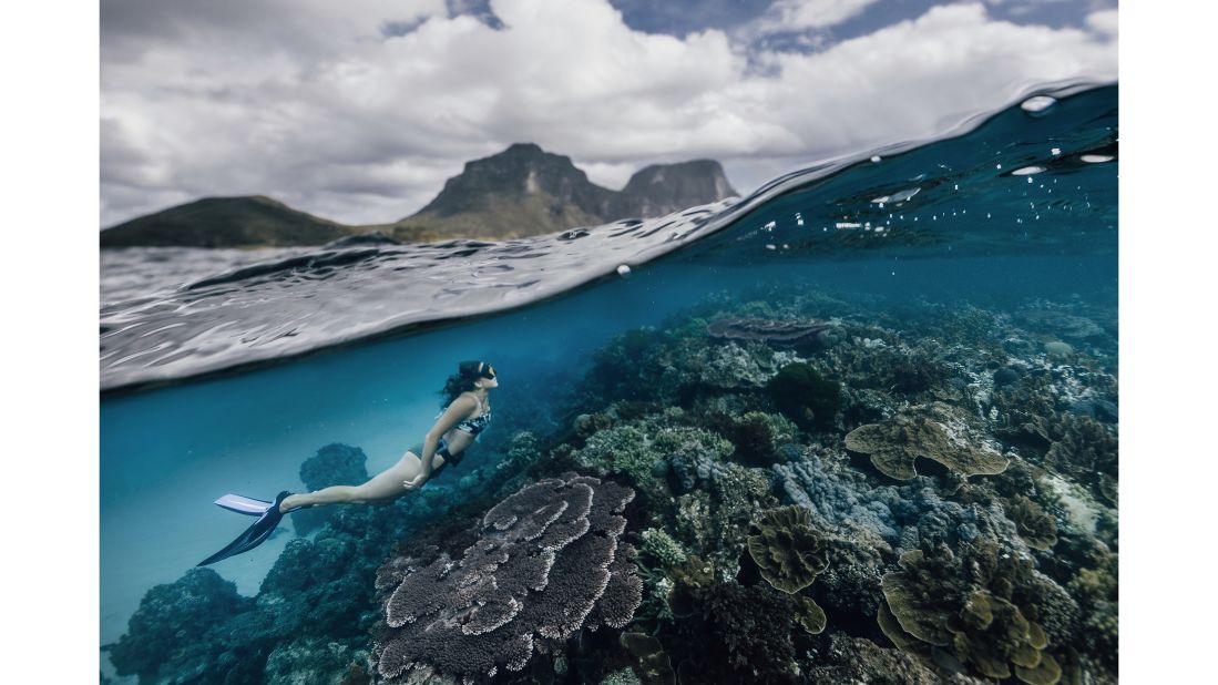 <strong>Lord Howe Island, Australia: </strong>A diver explores the coral reefs around Lord Howe Island. The volcanic isle, located in the Tasman Sea between Australia and New Zealand, has more than 60 dive sites, including Ball's Pyramid -- the world's tallest sea stack. 