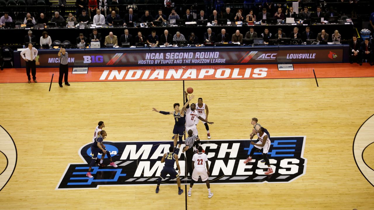 Tip off as the University of Michigan takes on the University of Louisville during the 2017 NCAA Men's Basketball Tournament held at Bankers Life Fieldhouse in Indianapolis, Indiana. The NCAA is currently in talks to hold this season's NCAA tournament entirely in Indianapolis.
