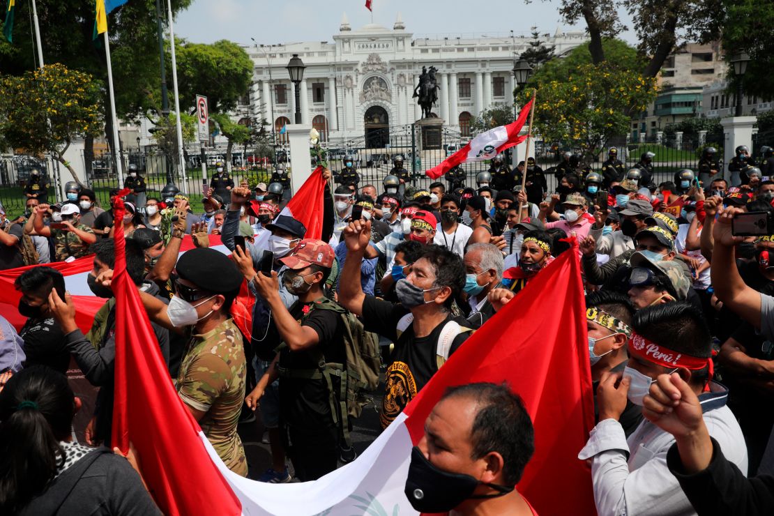 People demonstrate in favor of democracy and against corruption outside Congress in Lima, Peru, on November 16.