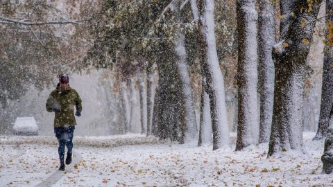 "It's glorious," said Colin Prince, as he jogs through the snow on Friday in Spokane, Washington. Yes, it's possible to shift your mindset about wintertime.