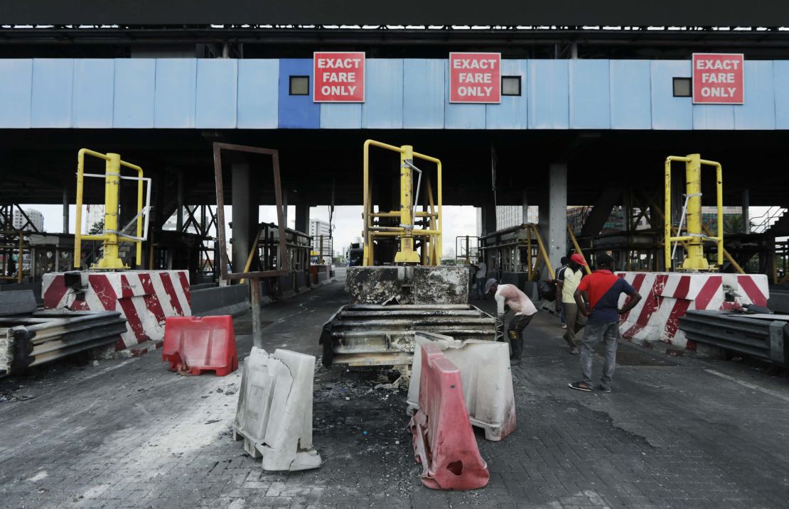 Workers clean up the Lekki toll gate on October 24.