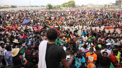 Demonstrators protest police brutality at the Lekki toll gate on October 20, 2020, in Lagos, Nigeria. Security forces later opened fire to disperse the crowd, killing several people. 