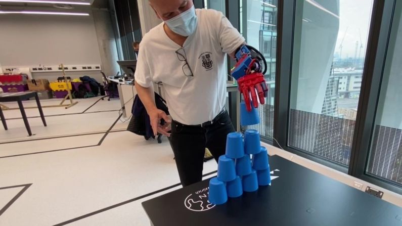 For the competition, pilot Conrad Christian Bona used the arm to perform tasks such as stacking cups -- to demonstrate a range of motion in the forearm and wrist.