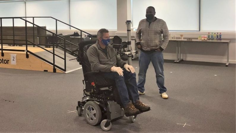 Moore piloted the wheelchair during the Cybathlon event, with team manager Mahendran Subramanian acting as an object that the wheelchair must navigate around. 