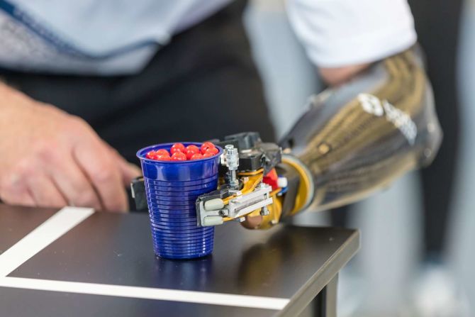 Handling an object like a plastic cup needs great precision from a prosthesis and pilot ...