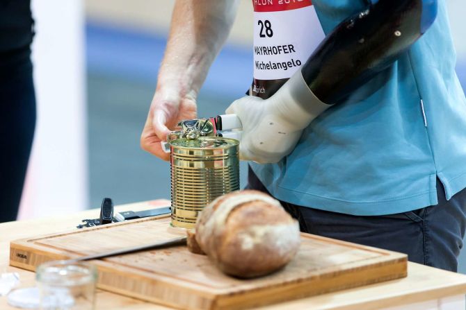 Using a can opener requires thinking about pressure, movement and grip.