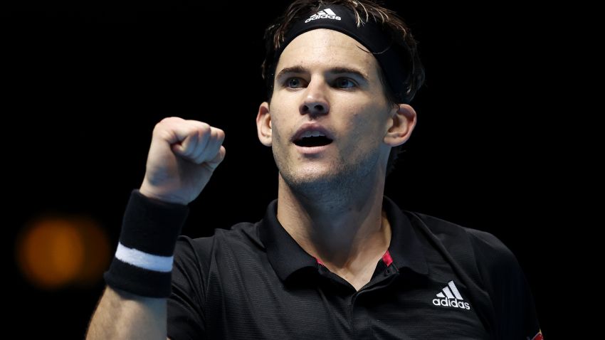 LONDON, ENGLAND - NOVEMBER 17:  Dominic Thiem of Austria celebrates winning match point during his singles match against Rafael Nadal of Spain during day three of the Nitto ATP World Tour Finals at The O2 Arena on November 17, 2020 in London, England. (Photo by Clive Brunskill/Getty Images)