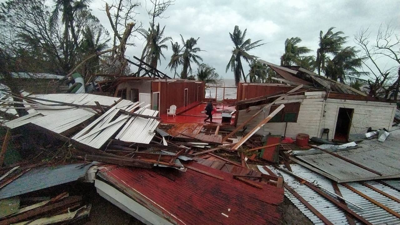 A man walks trough the severely damaged building of Hospedaje Cortijo 2 inn in Puerto Cabezas, Nicaragua.
