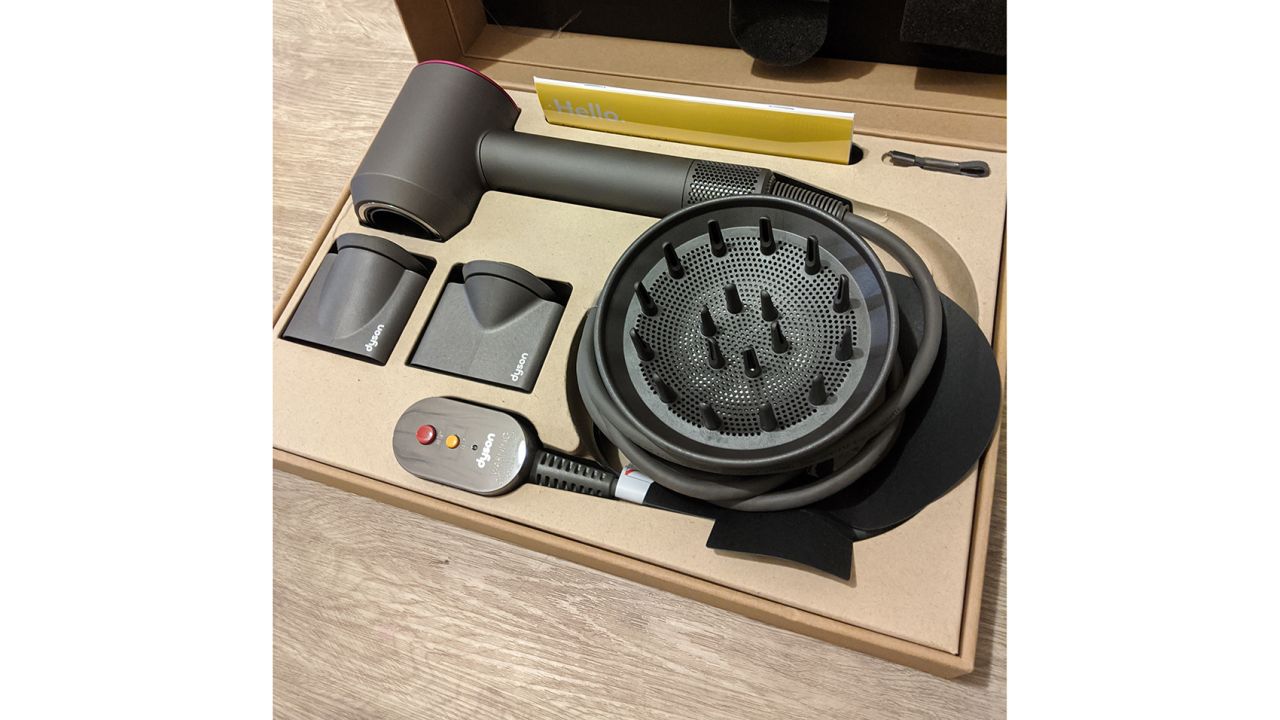 The Dyson Supersonic upon arrival in its box, with attachments