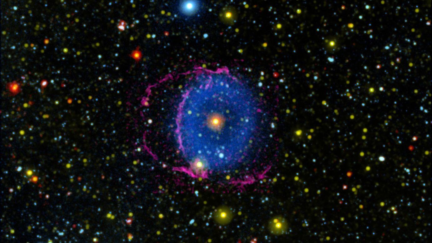 The Blue Ring Nebula is thought to be a never-before-seen phase that occurs after the merger of two stars. Debris flowing out from the merger was sliced by a disk around one of the stars, creating two cones of material glowing in ultraviolet light.