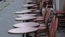 11 November 2020, Berlin: Empty tables and chairs stand in front of a restaurant on the street "Unter den Linden". Federal and state governments have decided on a partial lockdown for the month of November. Photo: Paul Zinken/dpa (Photo by Paul Zinken/picture alliance via Getty Images)