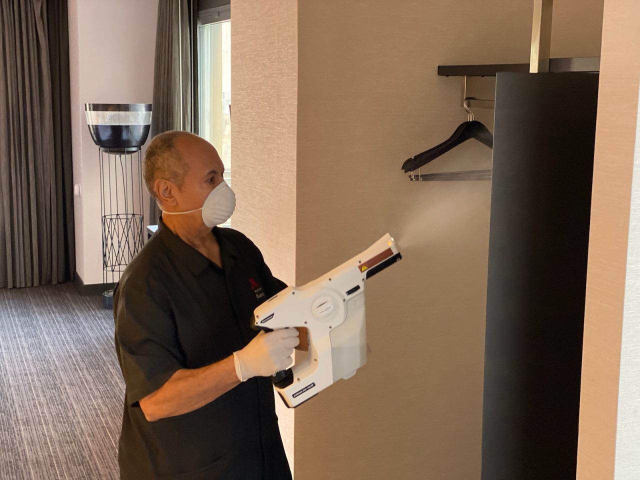 Hotel chains have upped their disinfecting measures. Experts advise steering clear of common areas.