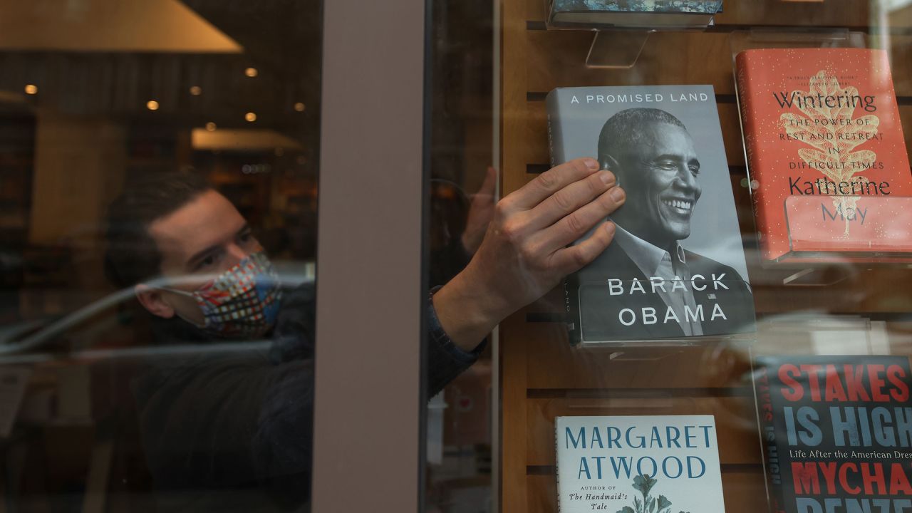 Former President Barack Obama's memoir on a window display at the Greenlight Bookstore in Brooklyn on November 17, 2020 in New York City. 