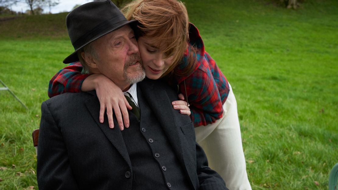 Rosemary Muldoon (Emily Blunt) gives neighbor Tony Reilly (Christopher Walken) a quare big hug. 